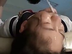 Asian schoolgirl gives perky deep throat and rides dick